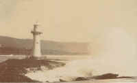 Lighthouse tower and breakwater c 1920